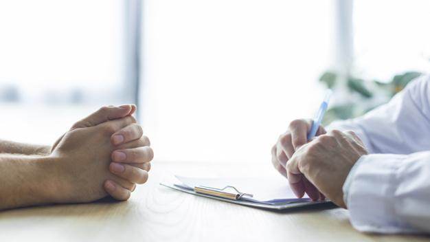 Doctor discusses the role of understanding exosomes with a patient.