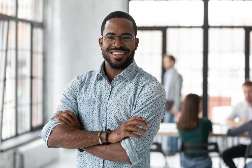 Cheerful man, reflecting positivity about testosterone knowledge.